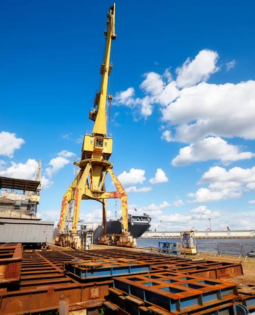 yellow-crane-in-a-shipyard-2023-11-27-05-01-46-utc